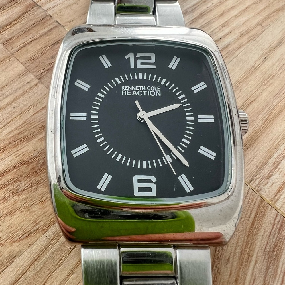 Kenneth Cole Reaction mens rectangular silver tone watch NEW BATTERY